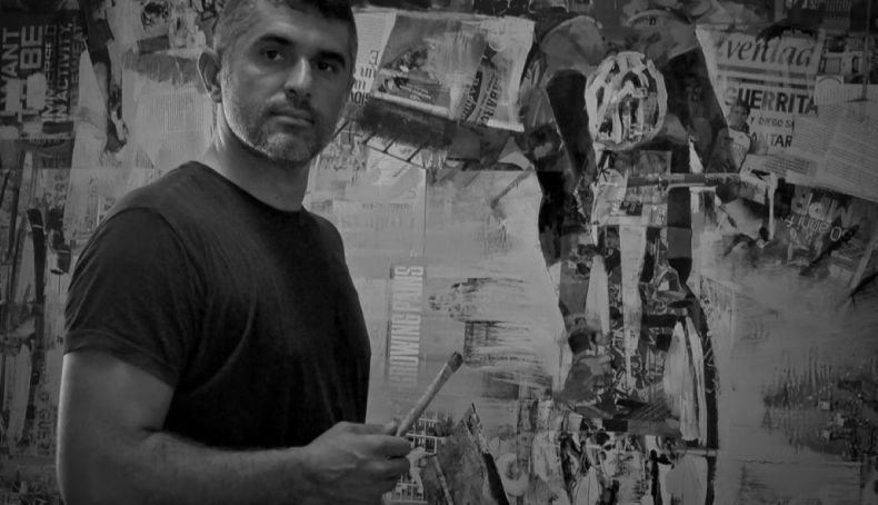 Migel Soro junto a una de sus obras de ambientación ciclista.